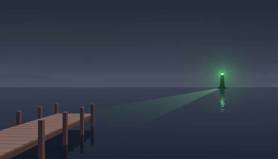 Green dock light glowing in fog at dusk over water